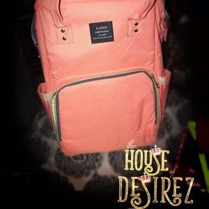 Mommy and me diaper bag by land